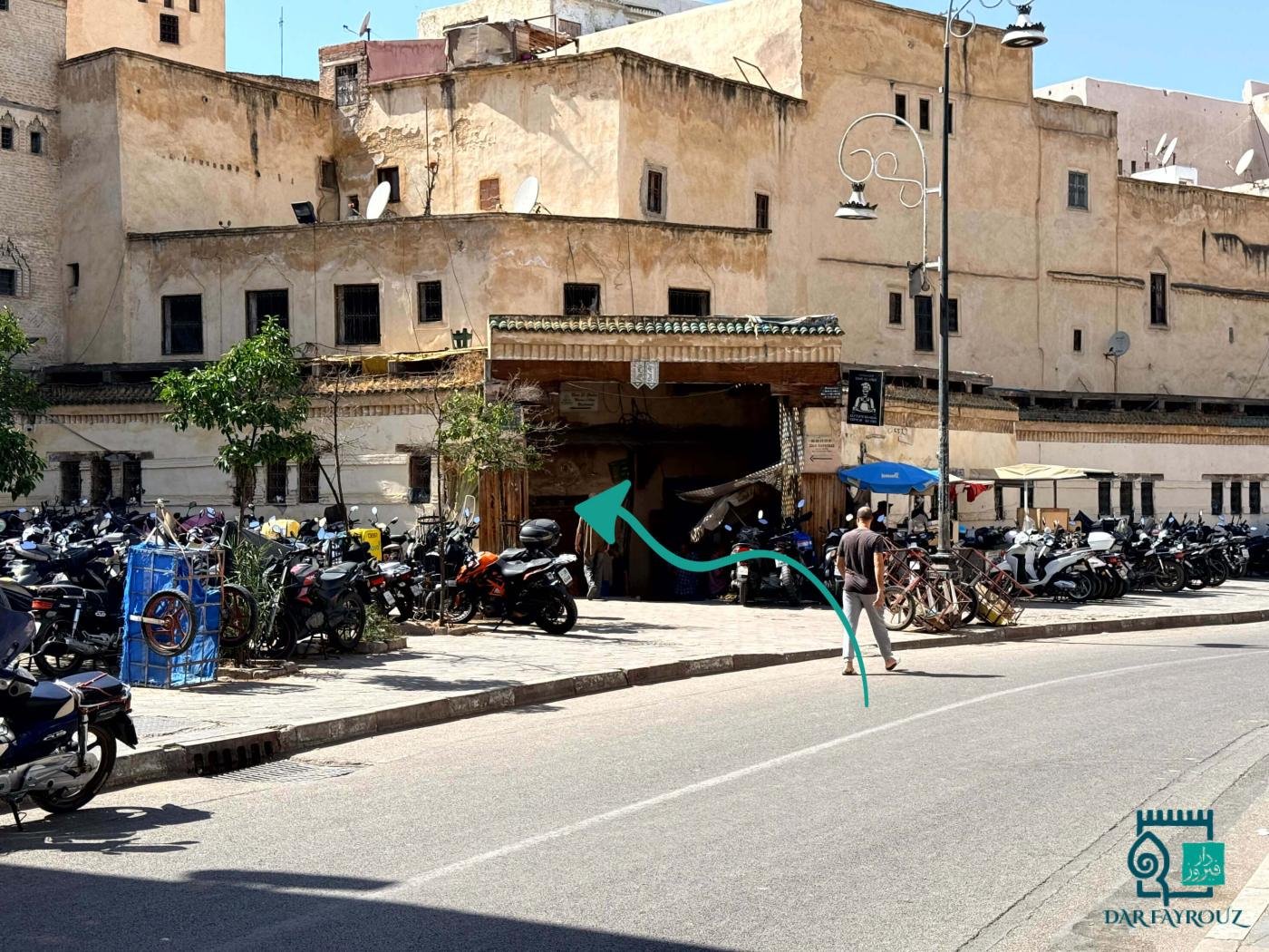 Closer view of the gateway behind the parked motorbikes